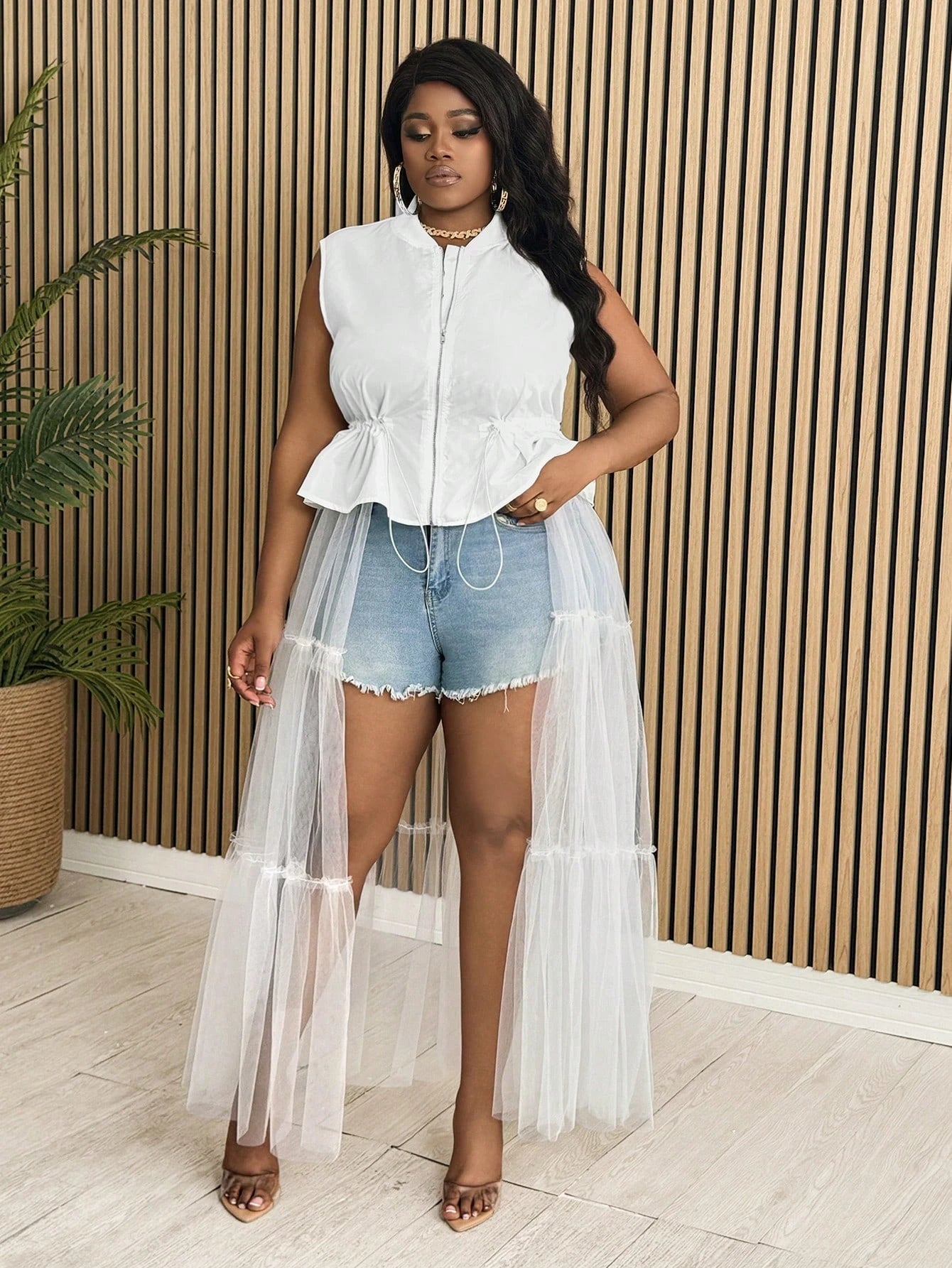 Plus- size mesh sleeveless ruffled top
