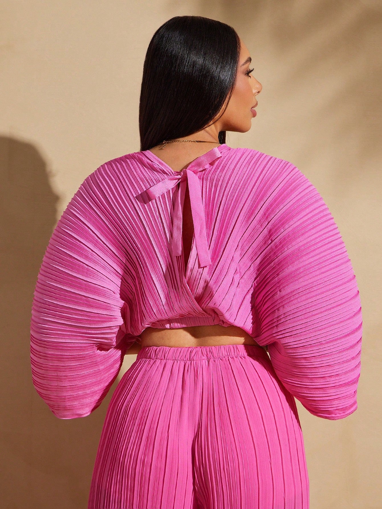 Plunge pleated neck self tie top