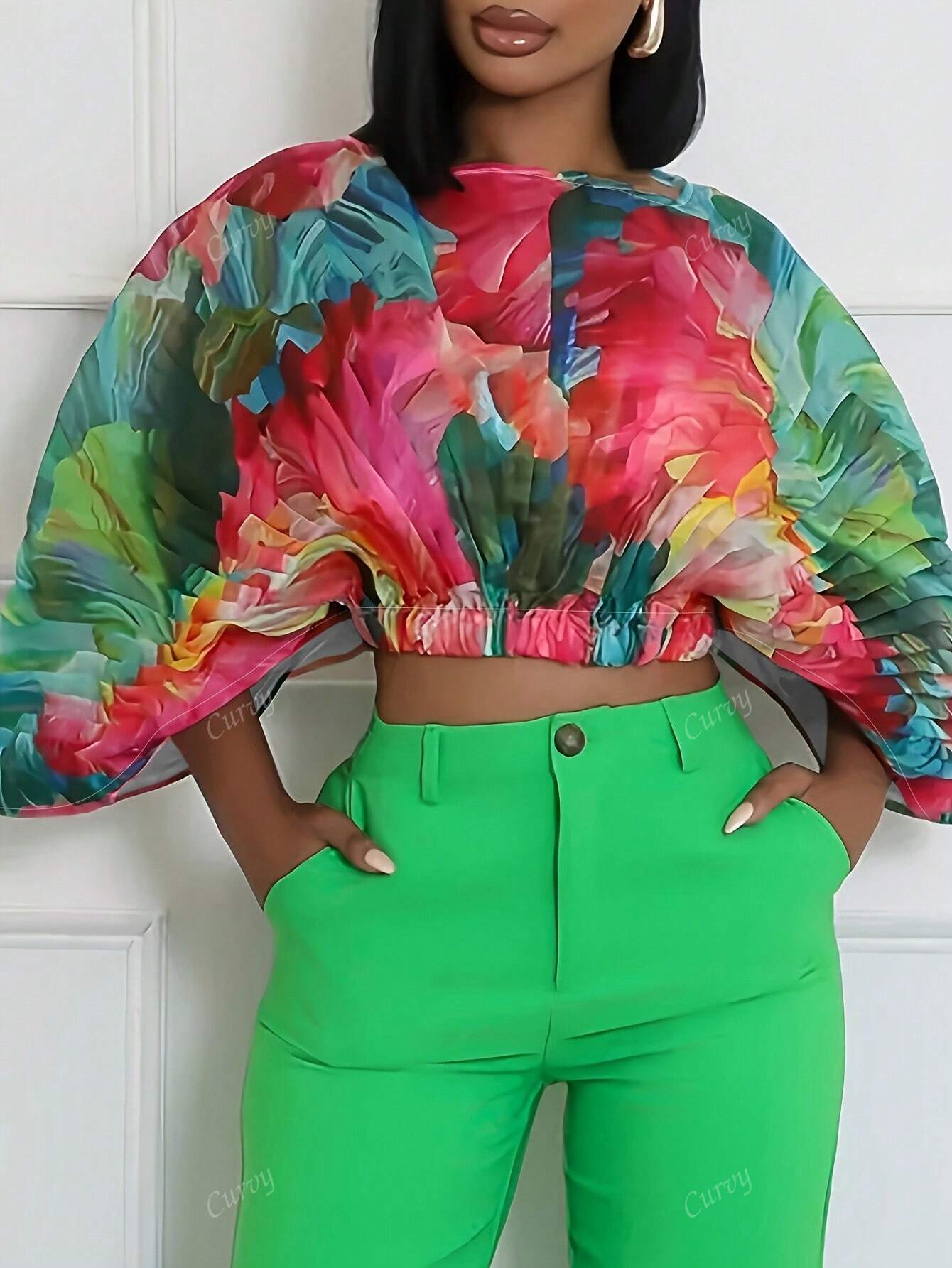 Plus size abstract print batwing sleeve top
