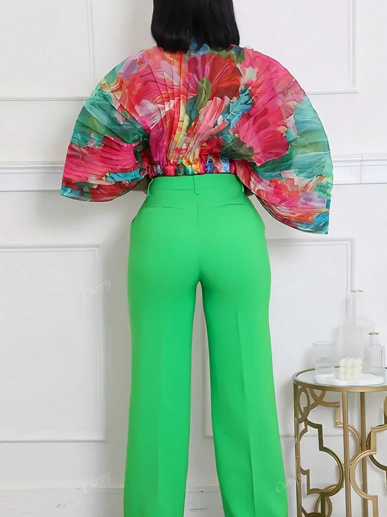 Plus size abstract print batwing sleeve top