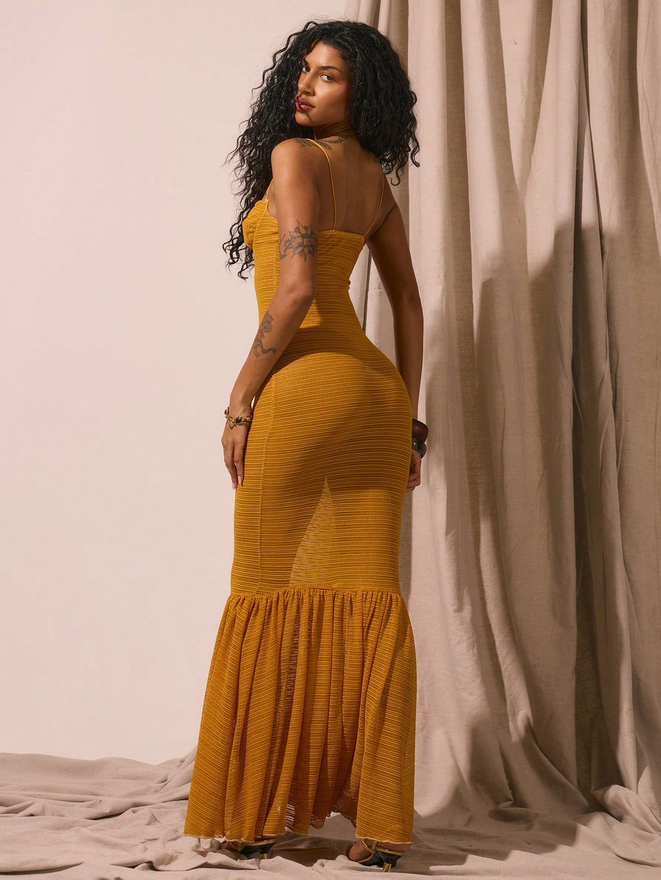 Sheer knit fitted fishtail maxi dress