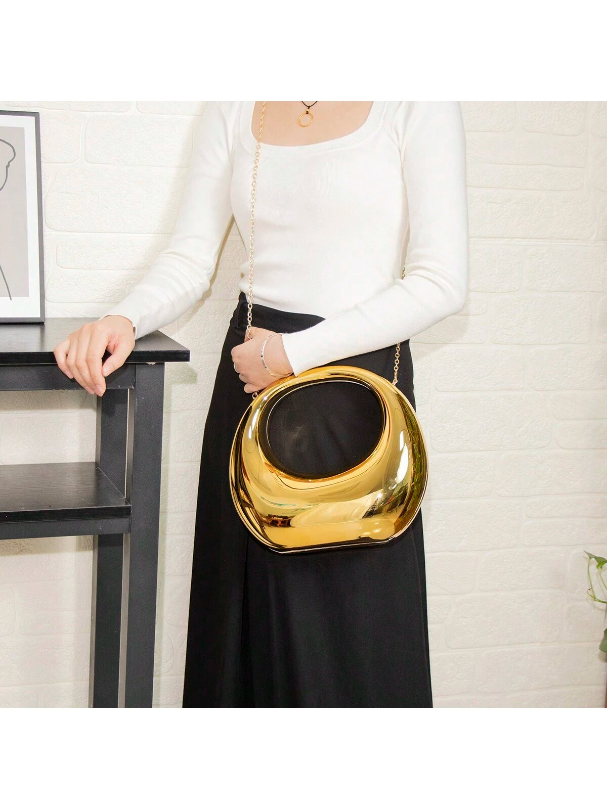 Metallic crescent bag