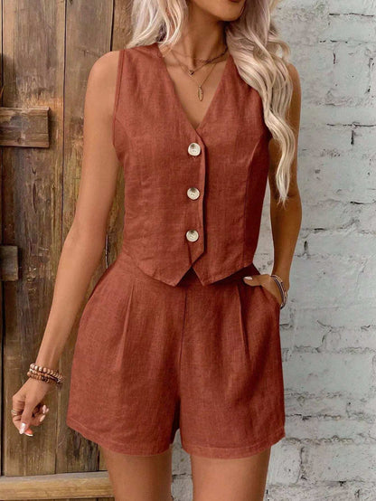 Two piece sleeveless button blouse and loose casual shorts