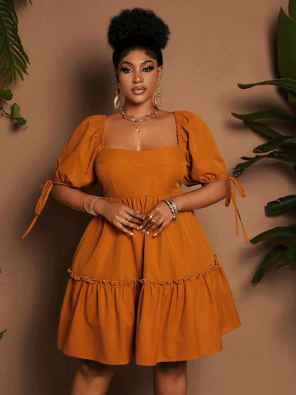 Plus-size puff sleeve tie back dress