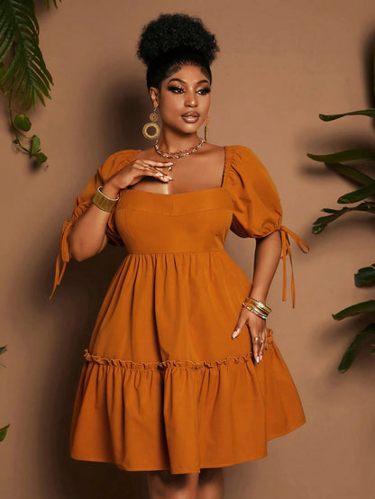 Plus-size puff sleeve tie back dress