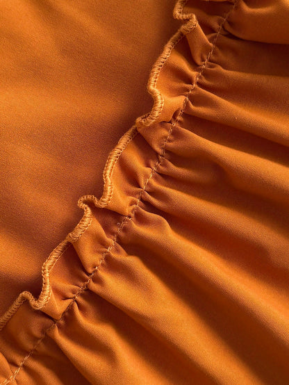 Plus-size puff sleeve tie back dress