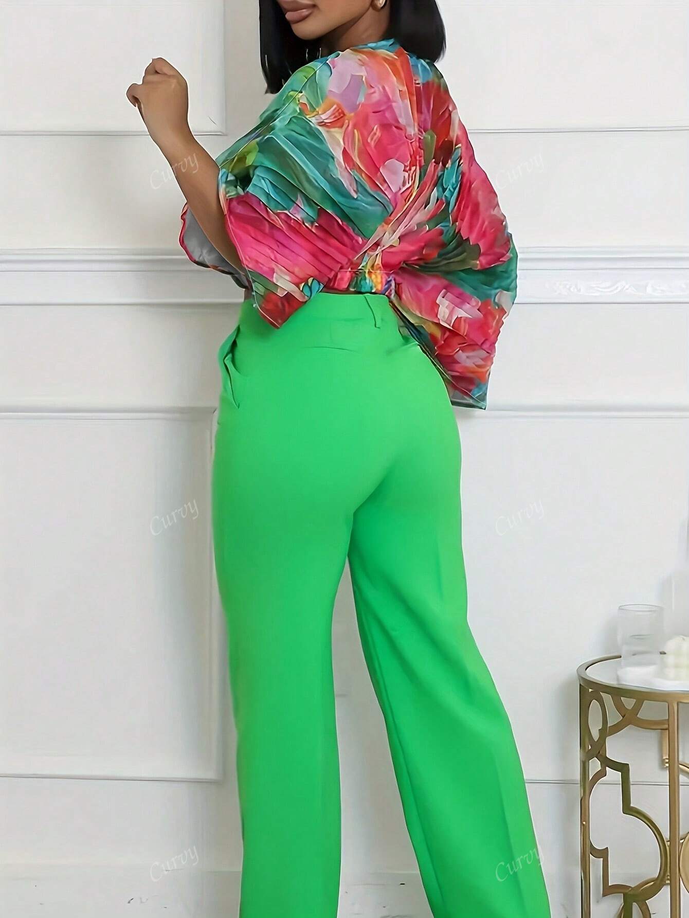 Plus size abstract print batwing sleeve top