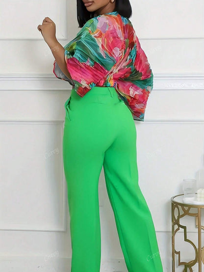 Plus size abstract print batwing sleeve top